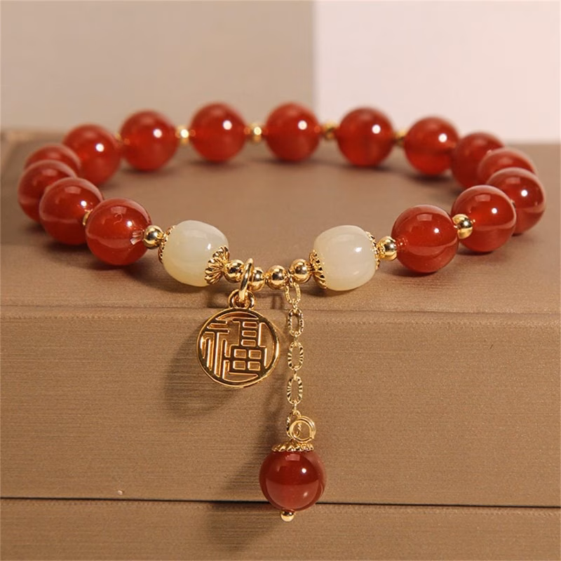 Pulsera de abalorios con dije